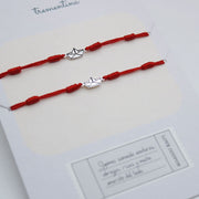 Set de Dos Pulseras Hilo Barquito de Papel Origami