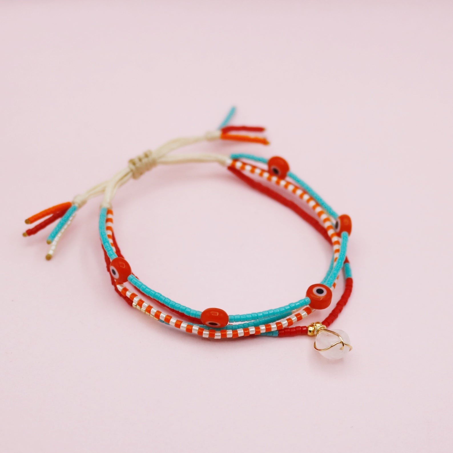 Pulsera Cuádruple Cuarzo Rosa Ojitos