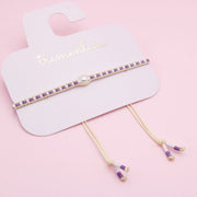 Pulsera Tejida Lila con Perla Central