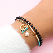 Pulsera Triple Huellita Dorada