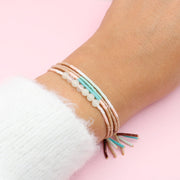 Pulsera Cuádruple de Mostacilla y Cuarzo