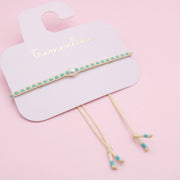 Pulsera Tejida Turquesa con Perla Central