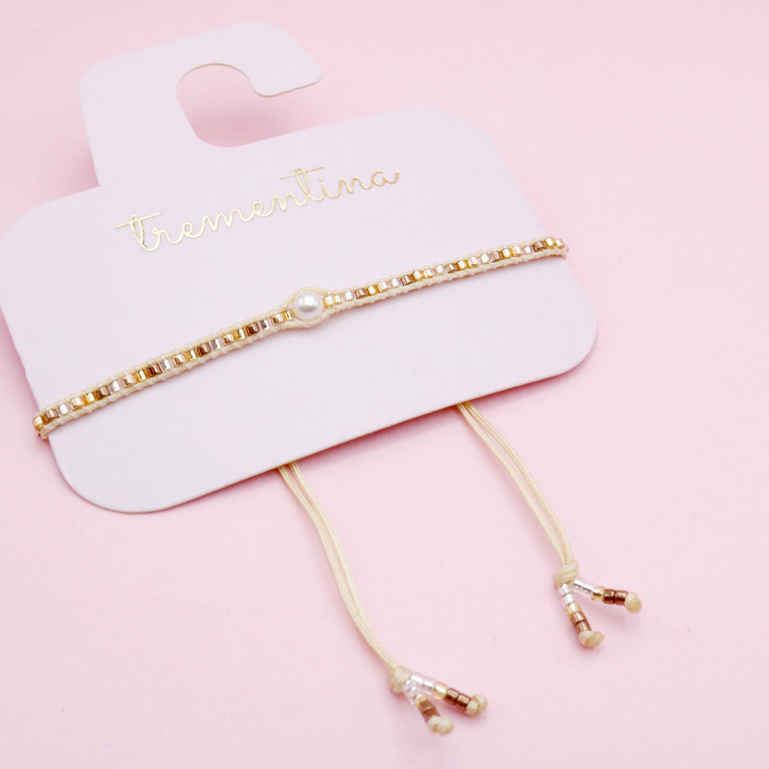 Pulsera Tejida Dorados con Perla Central