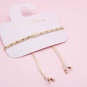 Pulsera Tejida Dorados con Perla Central
