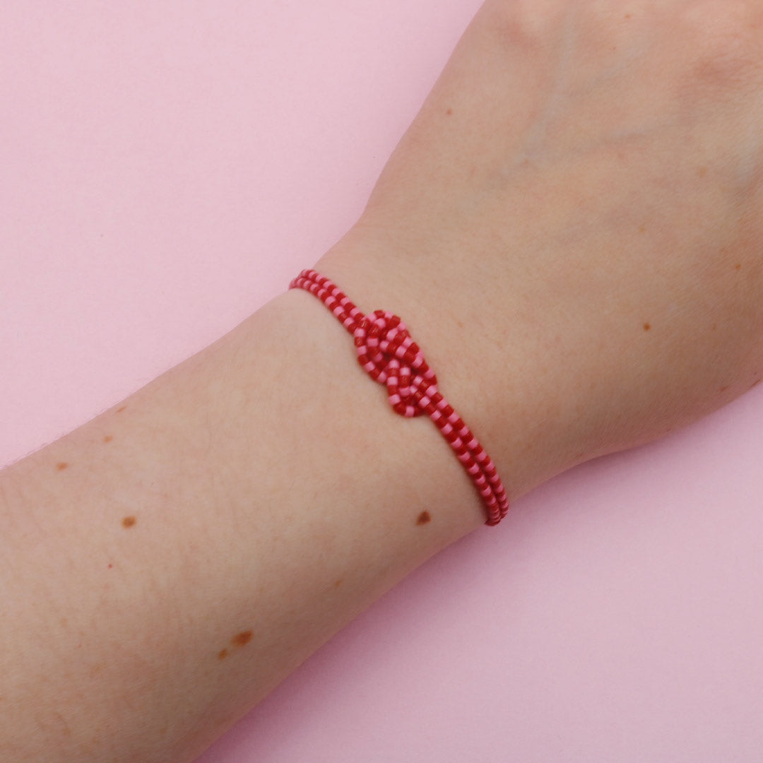 Pulsera Mostacilla Nudo Rosa y Rojo