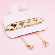 Pulsera Tejida Corazón Café