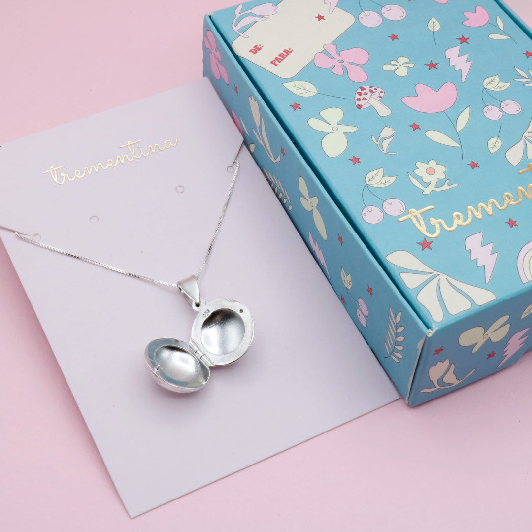 Relicario Circular Relieve en Plata